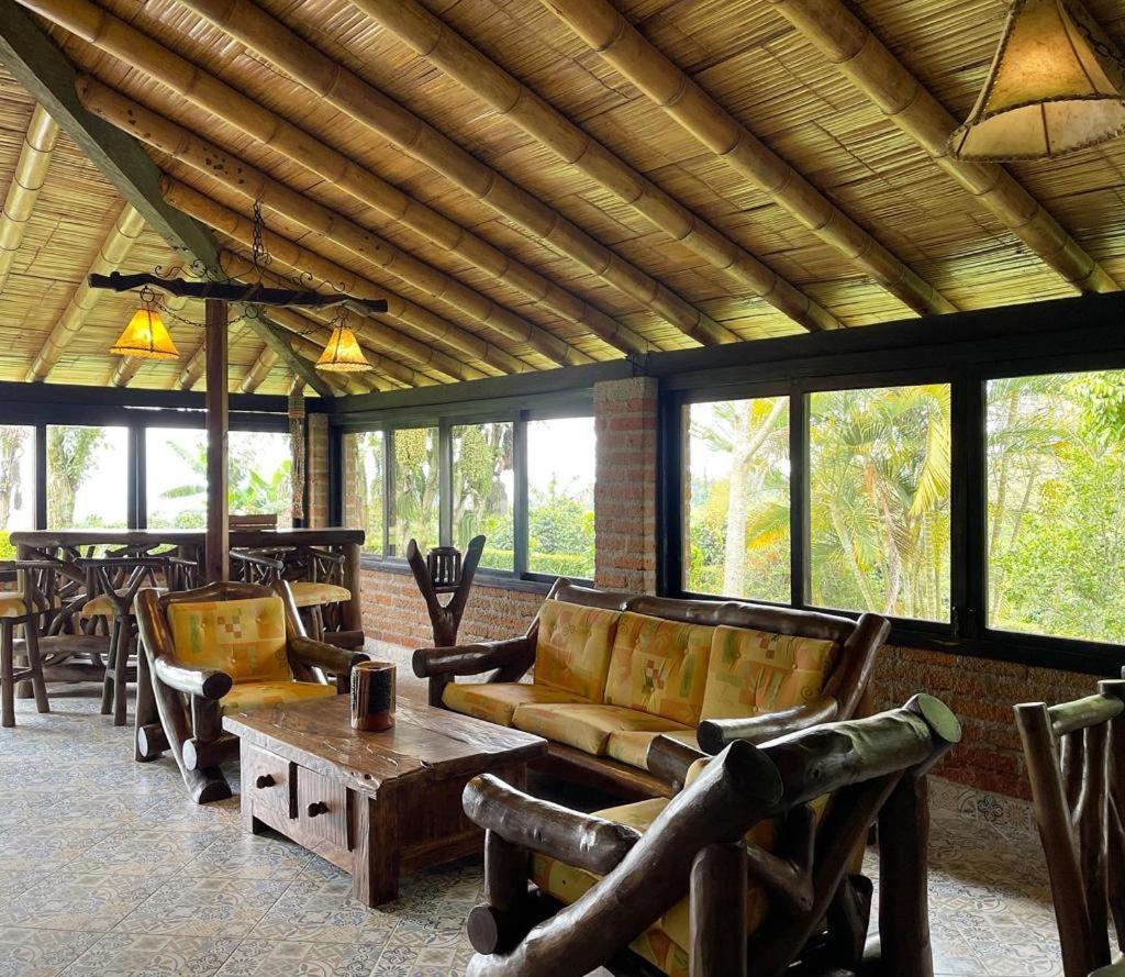 Hotel Bosques Del Saman Alcala Кимбайя Экстерьер фото