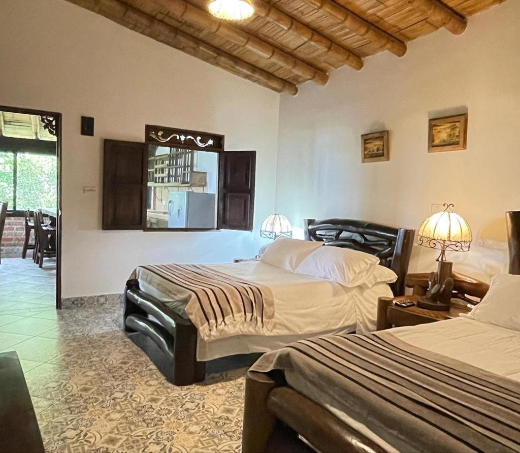 Hotel Bosques Del Saman Alcala Кимбайя Экстерьер фото