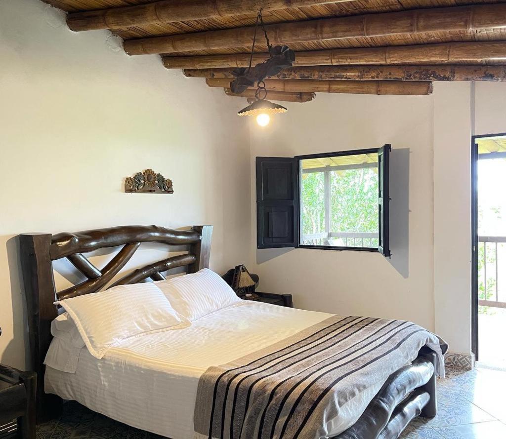 Hotel Bosques Del Saman Alcala Кимбайя Экстерьер фото