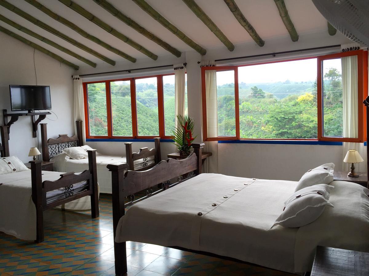 Hotel Bosques Del Saman Alcala Кимбайя Экстерьер фото