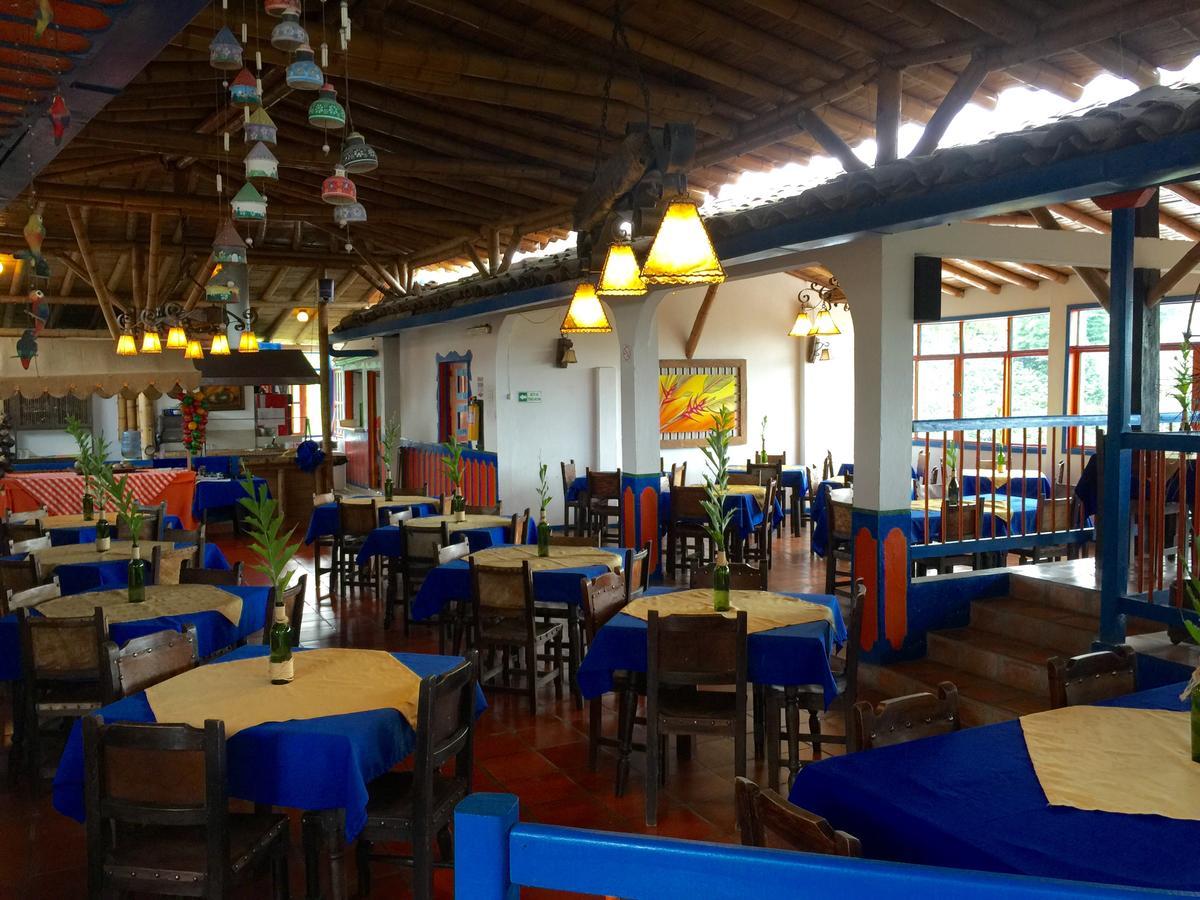 Hotel Bosques Del Saman Alcala Кимбайя Экстерьер фото