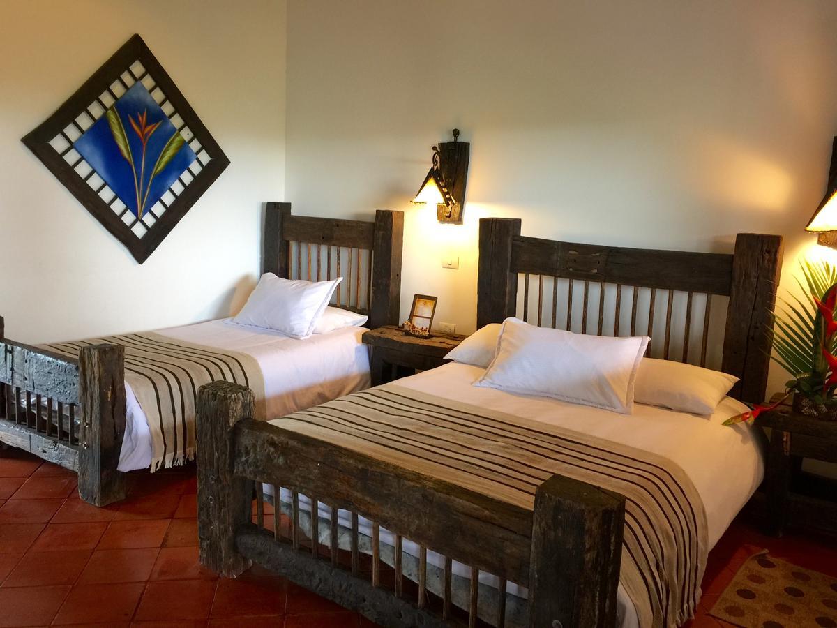 Hotel Bosques Del Saman Alcala Кимбайя Экстерьер фото
